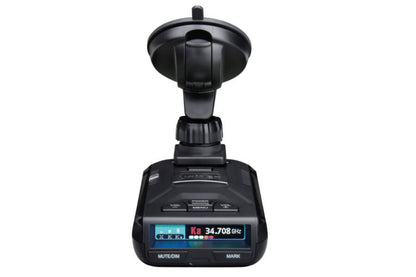 Uniden R3 radar detector top front view on white background with premium suction cup and screen turned on
